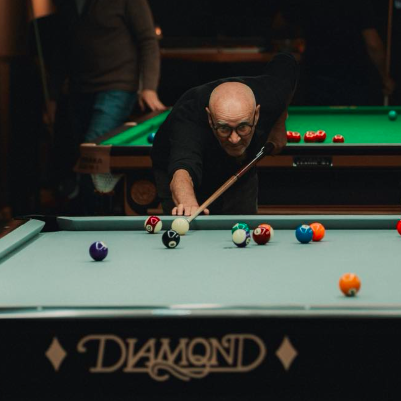 Screen Shot 2026-02-20 at 10.04.33 AM man playing pool